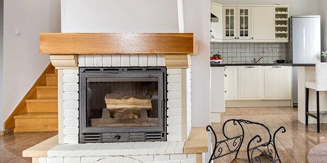opens in a new tab white brick fireplace with wood mantel